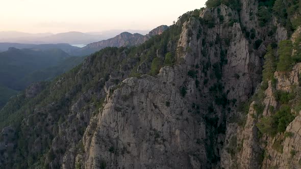 Sunset Over the River in the Mountains Filmed on a Drone alt