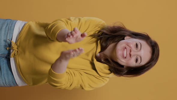 Happy Casual Woman Applauding Being Supportive Wearing Hoodie alt