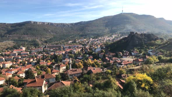 Small settlement in  Western Bulgaria 4K 2160p 30fps UltraHD panning footage - Slow pan on town of B alt