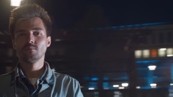 Portrait of a man while spinning at night