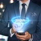Businessman Smartphone Hologram Word Country   Capital   Seoul - VideoHive Item for Sale