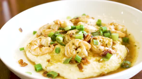Close up of shrimp and grits steaming fresh and ready to eat - dynamic motion alt