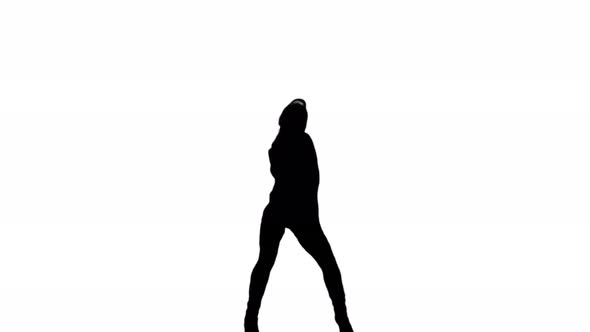 A Silhouette Woman Is Casually Dancing Against A White Background