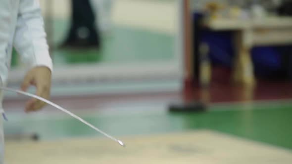 Fencing. Fencer During a Duel. Slow Motion. Kyiv. Ukraine alt