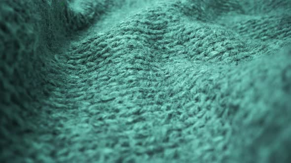 Extreme Detail View of Sheep Wool Cloth Texture Flowing in Macro Dolly Shot alt