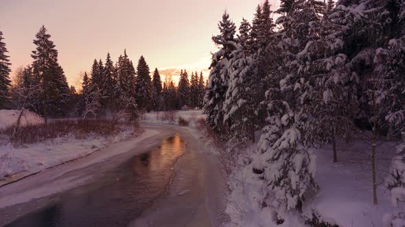 Amata river in winter at sunset in Latvia