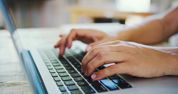 Typing on Laptop