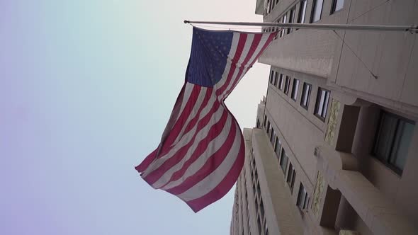 American Flag Hang From Facade of Building in New York City