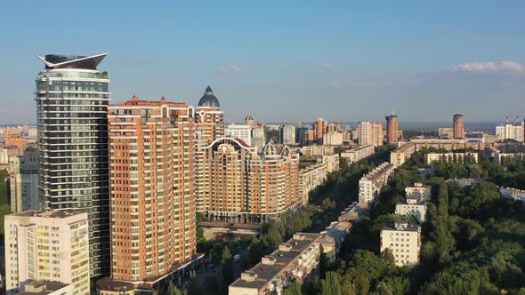 Aerial drone video of downtown skyline buildings and cars on the highway in Pecherskyi district of K alt