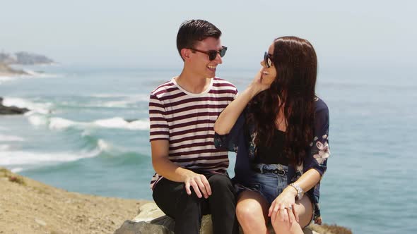 Young couple at the beach alt