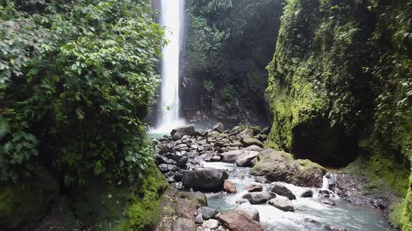 Cinematic Drone Shot of Scenic Waterfalls in the Tropical Jungle with Moss River Rocks and Lush alt
