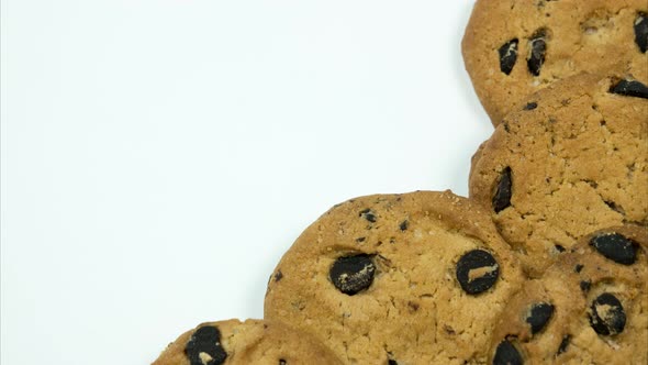 Round Cookies Spinning and Forming Background for Text. Stop Motion alt