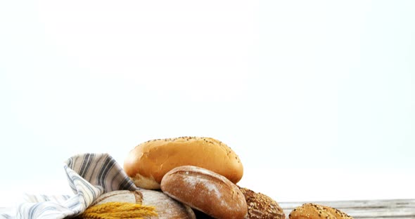 Various types of breads with wheat grains alt