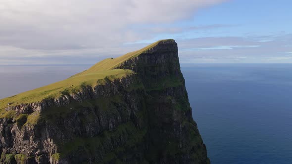 Drone Of Grass Peak Of High Sea Cliff Beinisvord alt