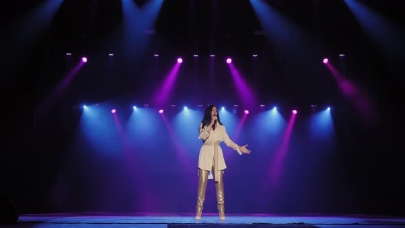 A Young Talented Singer Performs on Stage. Slow Motion. alt