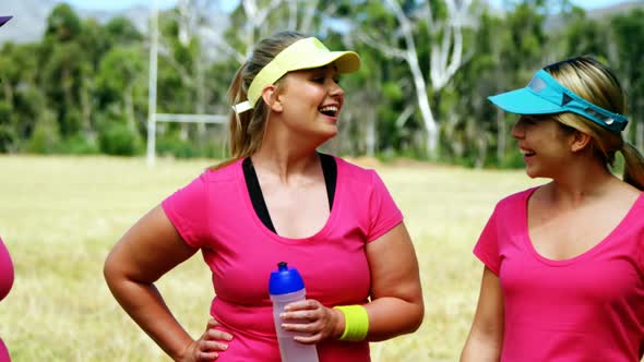 Group of women interacting with each other in the boot camp alt