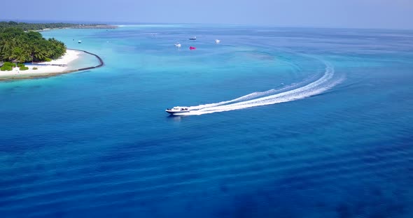 Luxury drone travel shot of a sunshine white sandy paradise beach and aqua turquoise water backgroun alt