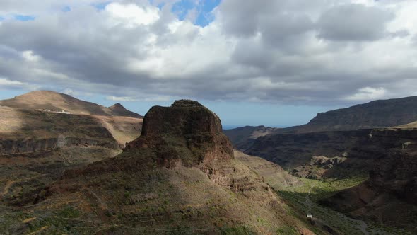 Ansite Fortress, aerial shot in orbit of the mountain located near the Ansite Fortress on the island alt