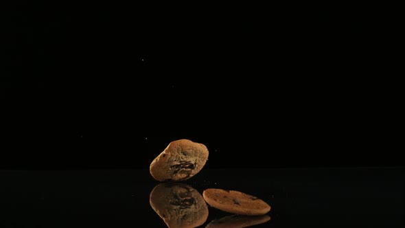 Cookies falling and bouncing in ultra slow motion alt