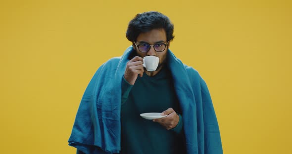 Sick Man Drinking Tea alt