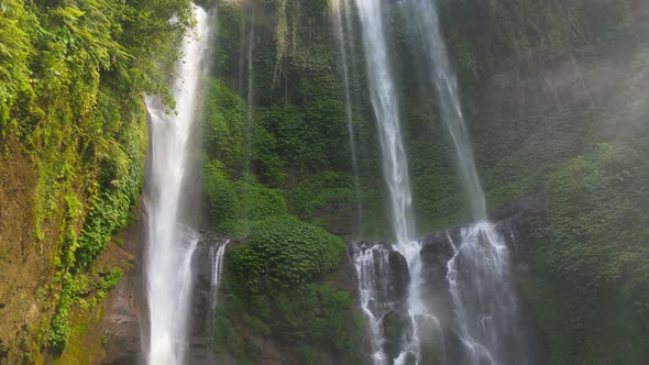 Sekumpul Waterfall in the Heart of Bali Island, Indonesia. Slow Motion alt
