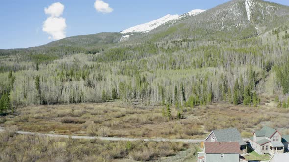 Aerial Establishing Shot of Mountain on the Edge of a Small Town (Frisco, Colorado) alt