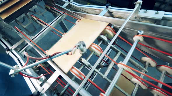 Industrial Machinery is Relocating Freshlyproduced Waffle Layers alt