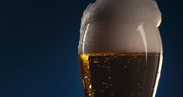 Overfilling A Glass With Beer