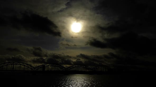 Night cityscape. Railroad bridge alt