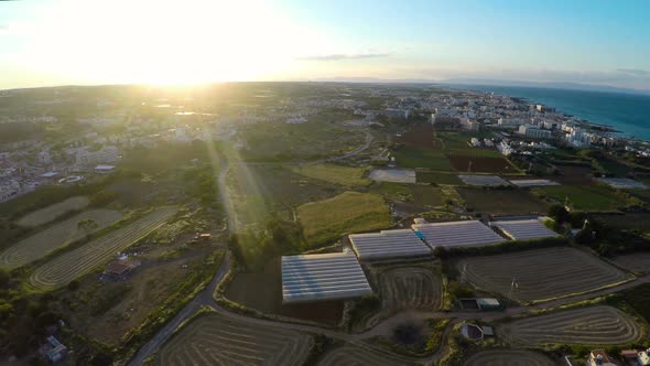 Tilled Agricultural Fields and Vegetable Greenhouses in Cyprus, Aerial View alt