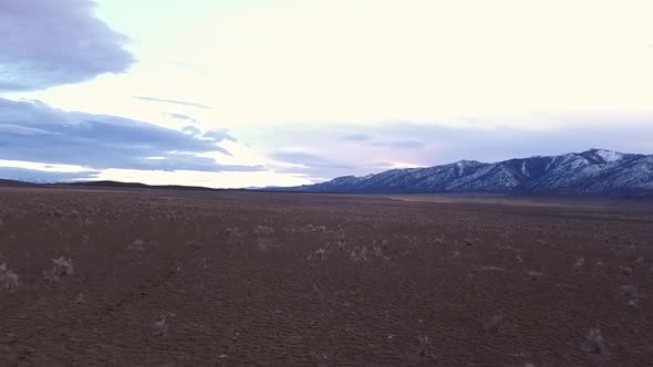 Cowgirl Riding a Horse in the American West alt