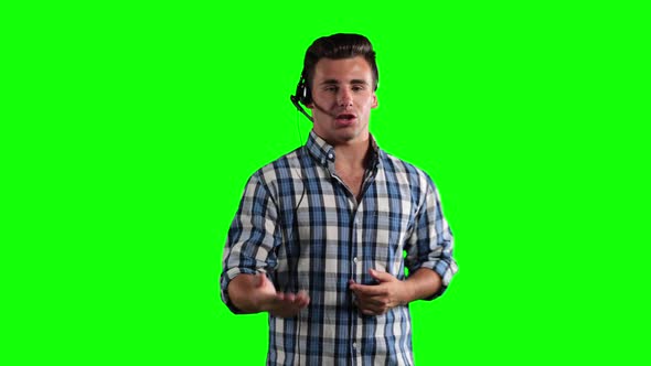 Animation of a Caucasian man using an earpiece and talking in a green background alt