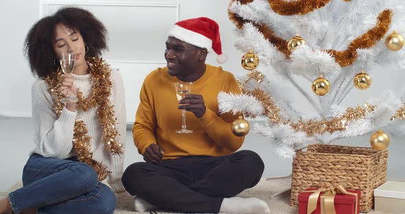 African Couple, Brother and Sister, Boyfriend and Girlfriend, Husband and Wife Sitting Together Near alt