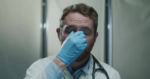 Professional Medical Worker in Face Mask Standing in Office Hospital