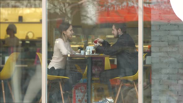 Young Couple in Cafe