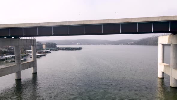 Epic Aerial Drone Shot Flying Under Ozarks Lake Bridge in Missouri alt