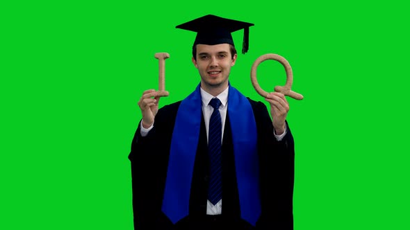 Smart Graduating Student Showing IQ Letters, Concept of intelligence