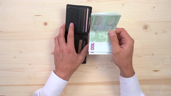 Hands counting euro notes alt