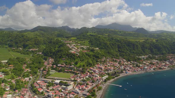 Aerial of houses and green landscape along Caribbean Coast, Saint-Pierre alt