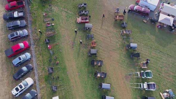 Downward Aerial of an Early Morning View of Opening Day at an Amish Mud Sale alt