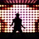 A Silhouette Man Dancing Against A Lighting Stage - VideoHive Item for Sale