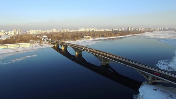 Aerial View Car Bridge Over Frozen River in Winter City, Outdoor Metro Railways alt