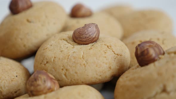 Slow pan home made cookies on pile close-up  4K 2160p 30fps UltraHD footage - Baked biscuits with ha alt