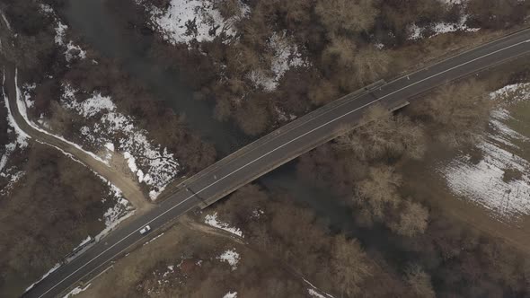 Traffic over the bridge from above 4K aerial video