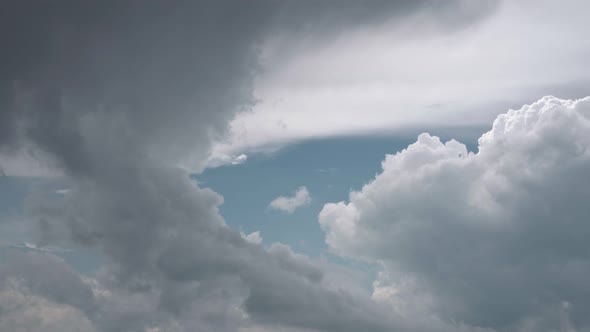 Time-lapse sky with dark clouds. Dramatic sky. alt