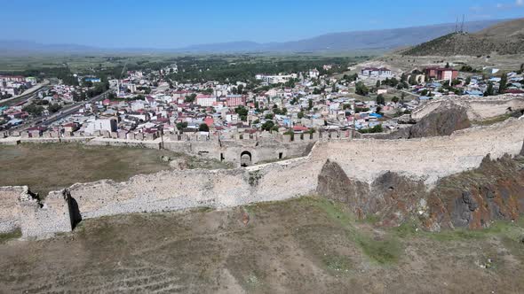 historic castle wall and cityscape alt