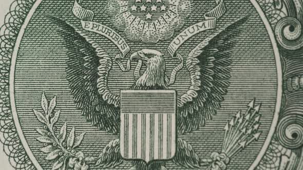 Zooming in Effect To Eagle with Flag on Dollar Bill
