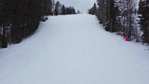 Aerial View of Downhill Skiing at Local Ski Resort. Ski Lift. Russia, Leningrdaskaya Oblast, Village