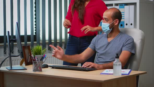 Wearing Face Mask in New Normal Office alt