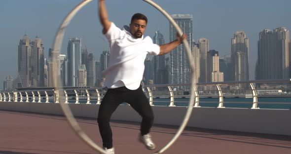 Stunning Wheel Gymnastics Tricks By a Young Man on The Palm Jumeirah alt